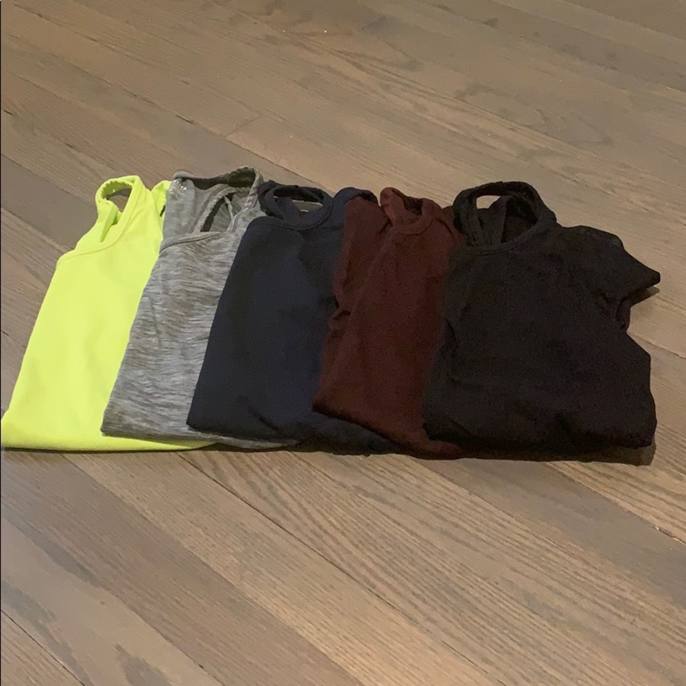 Athleta “Speedllight” tank. $20 each
